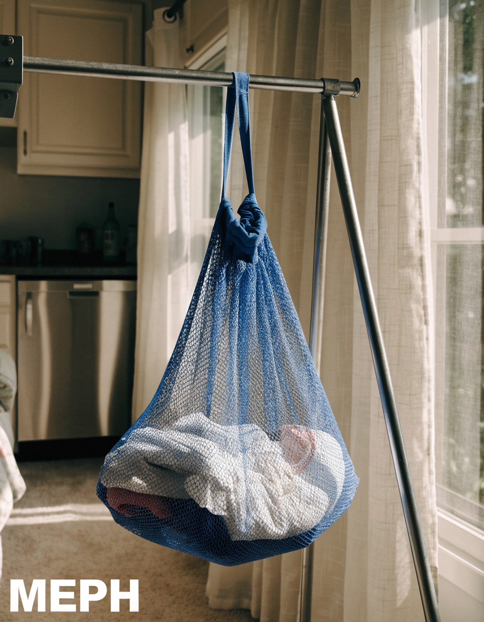 Illustrative visual for Honey-Can-Do LBG-01161 Mesh Laundry Bag with Drawstring, Blue, 24-inches L x 36-Inches H