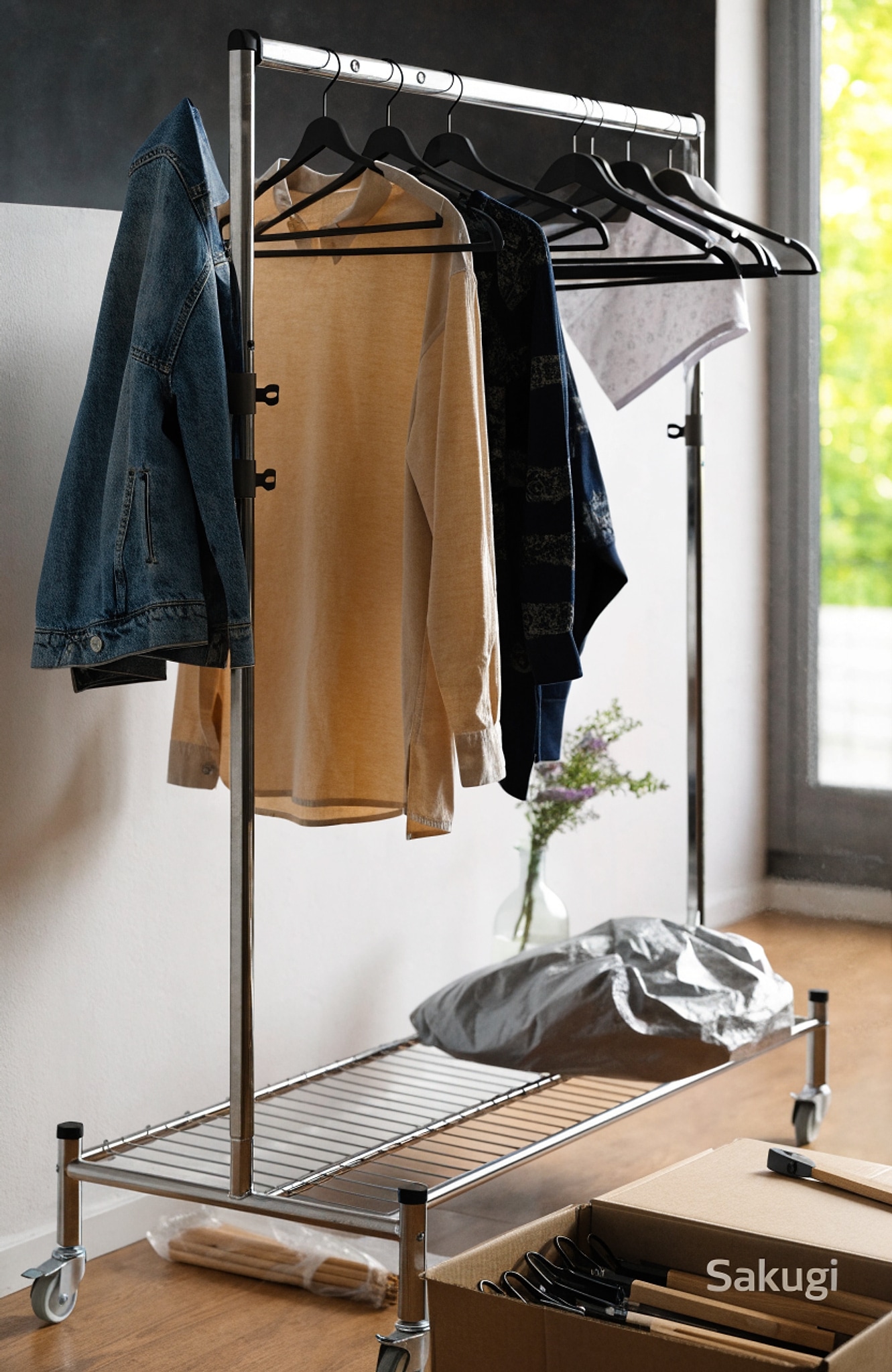 Illustrative visual for Sakugi Clothing Rack - Heavy-Duty Stainless-Steel Coat & Clothes Rack with Anti-Slip Stoppers, Mesh Shelf & Wheels, Versatile Garment Hanger for Bedroom, Laundry, Shop, 110.0 x 42.3 x 163.3 cm, Silver