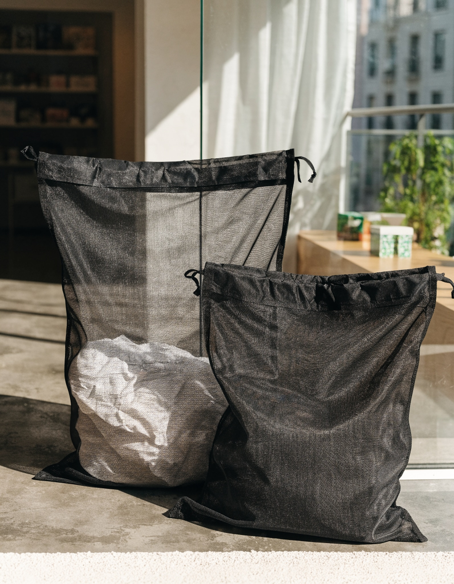 Illustrative visual for 2 Pack Large Mesh Laundry Bags for Washing Delicates, Heavy Duty Dirty Clothes Washing Net Bag Wash Machine Travel Storage Organizer for Clothes (50x60 cm/ 60x60 cm)