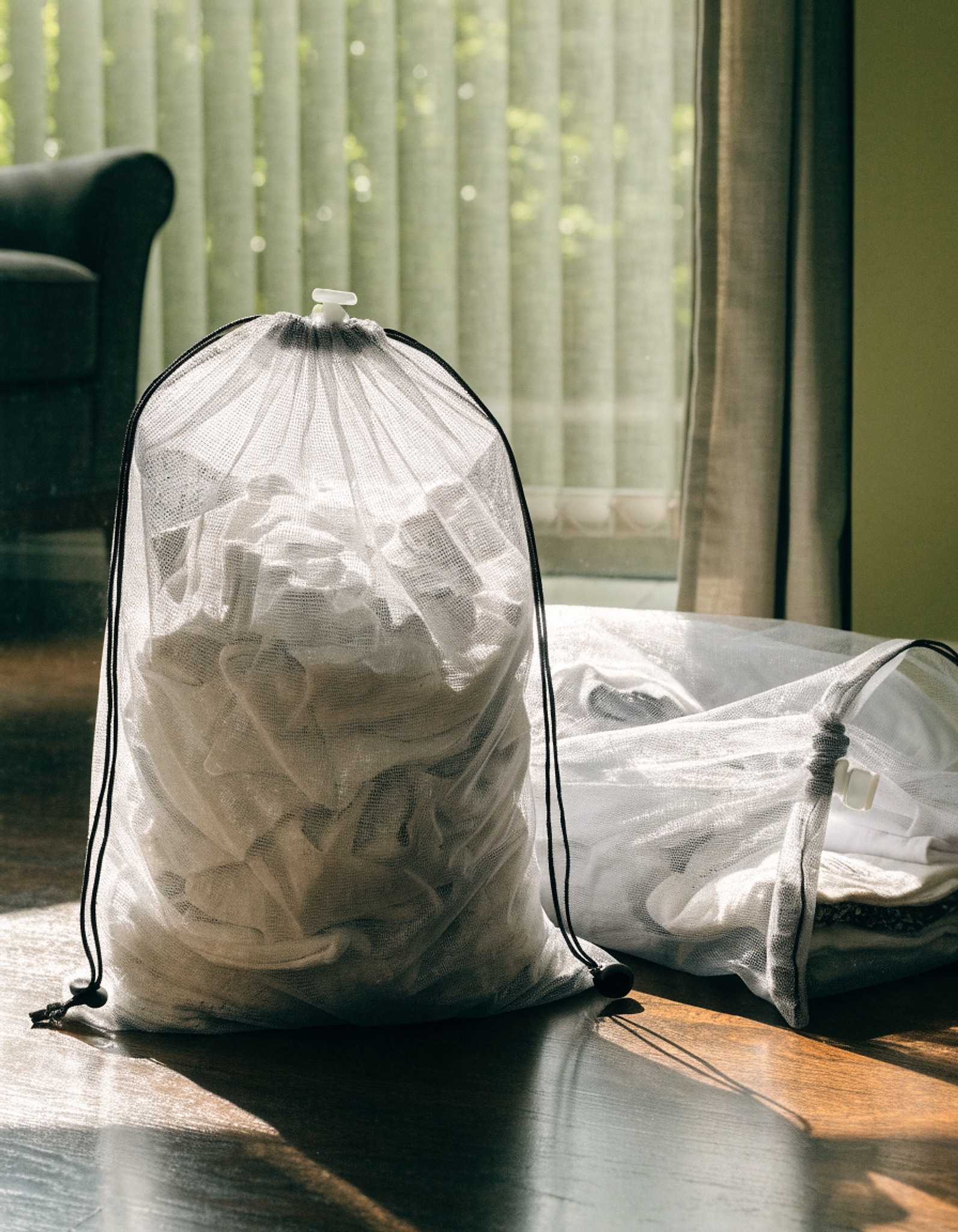 Illustrative visual for 2 Pack Mesh Laundry Bags 23x34 Inch Drawstring Locking for Travel Home