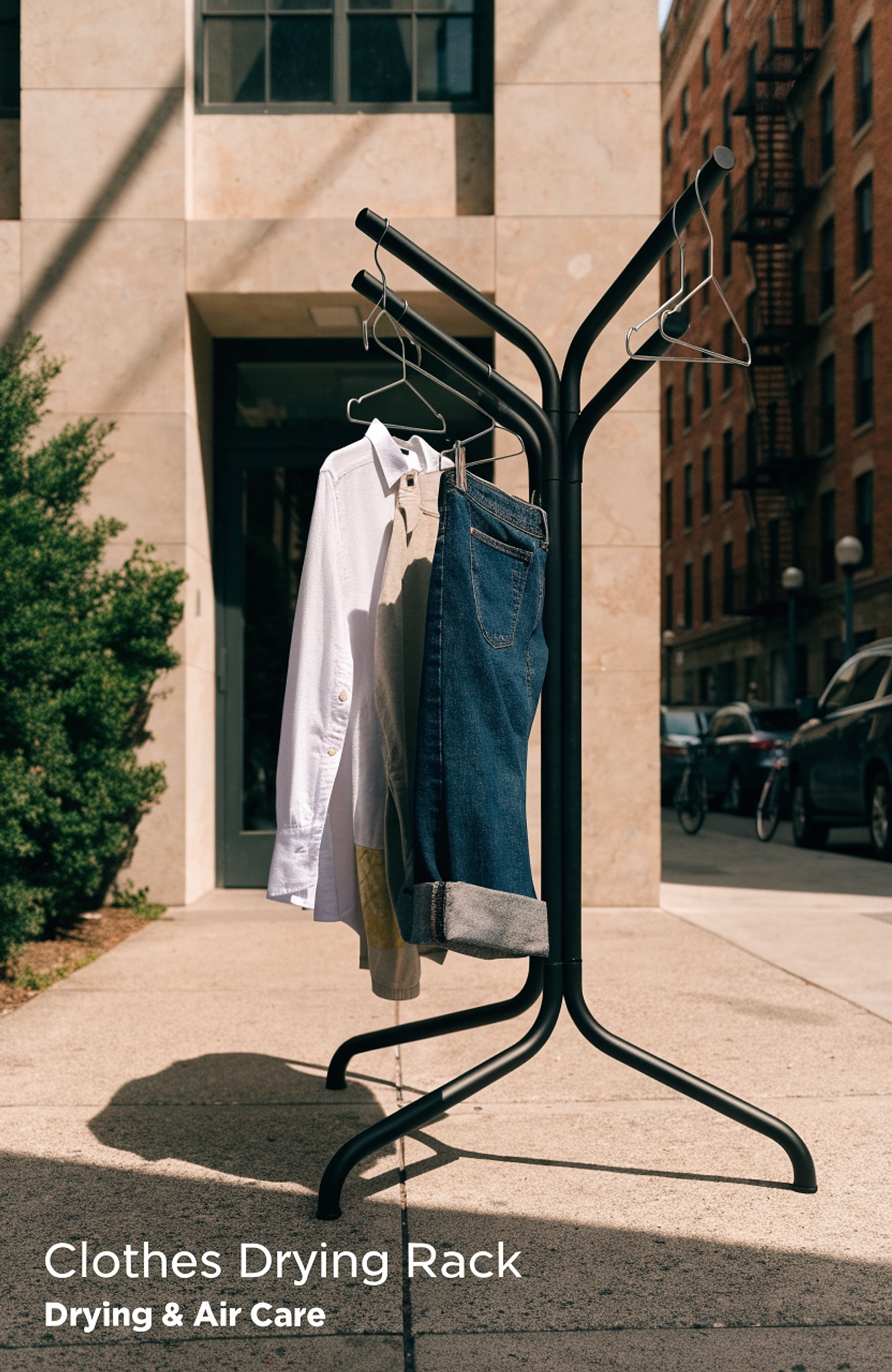 Illustrative visual for KINGBOARD Clothes Drying Rack, 59" H with 3 Rotatable Arms for Hangers