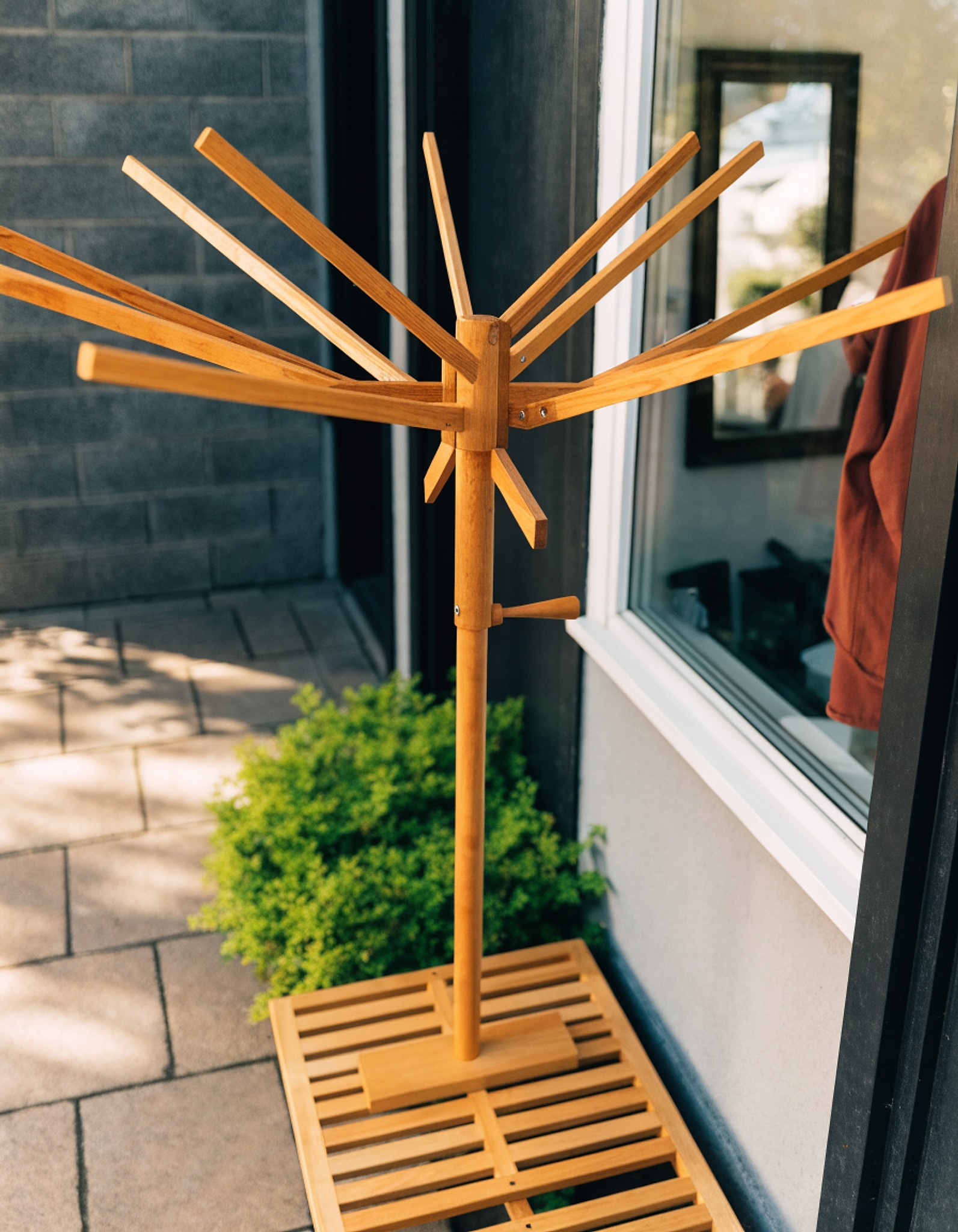Illustrative visual for Clothes Drying Rack, Foldable Wooden Laundry Drying Rack with 12 Rotating Arms, Space-Saving Standing Laundry Rack for Indoor/Outdoor, Balcony and Laundry Room